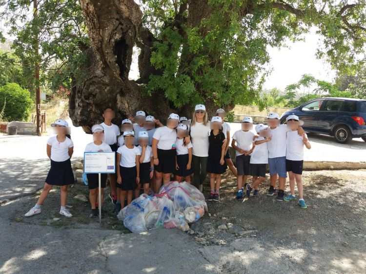 I clean cycling and hiking spots! I actively participate! Primary School of Apesia
